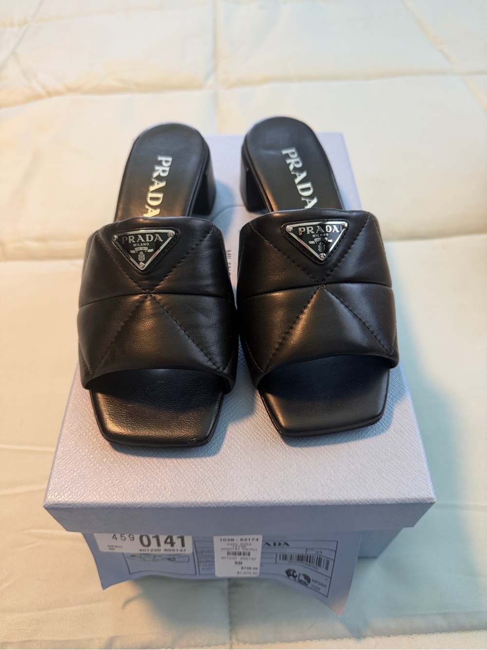 Prada Black Quilted Leather Slide Mules with Logo Triangle